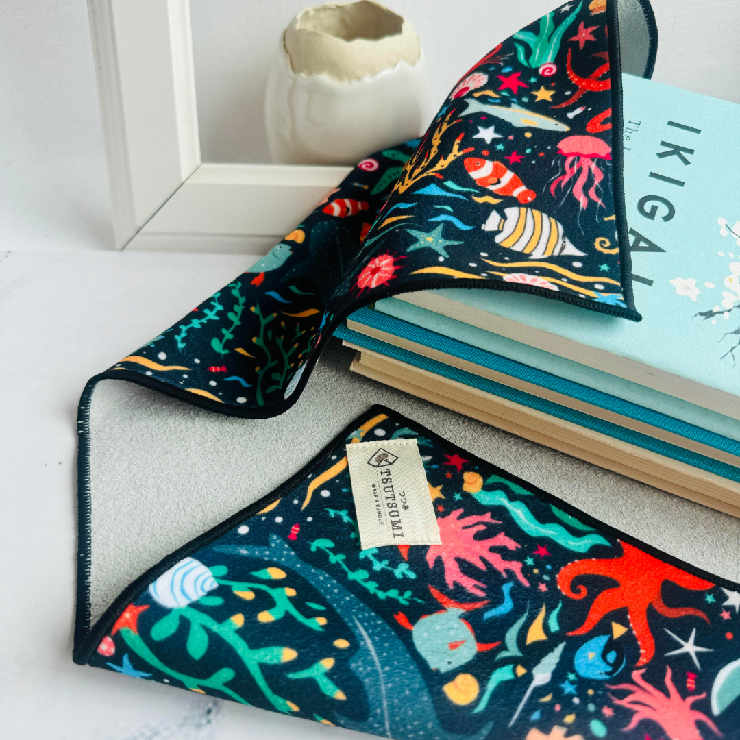 Clingy Wrap holding 3 books