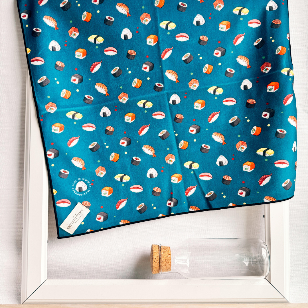 Dark Teal fabric with sushi pattern draping over a picture frame