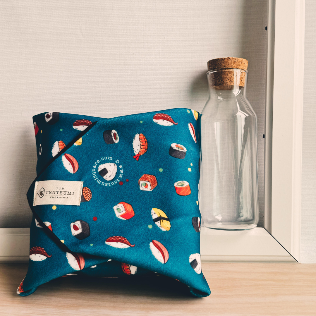 Dark Teal fabric with sushi pattern wrapping some books