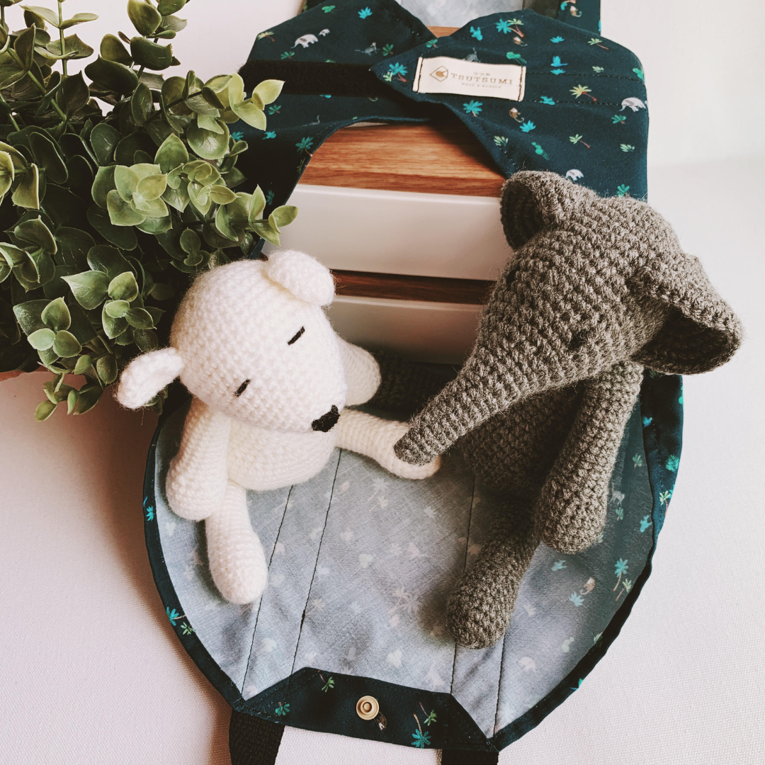 Handmade Square Wrap with Our World print and crochet polar bear figurine and crochet elephant figurine